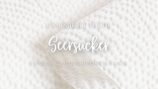 Tela algodón seersucker con textura ligeramente corrugada, ideal para prendas frescas de primavera y verano.
